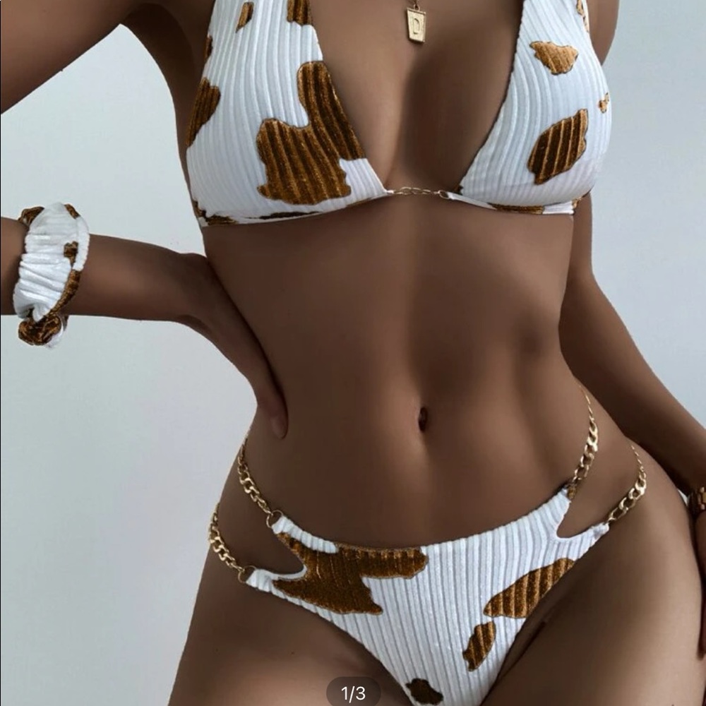 Brown cow print triangle bikini with chain accent